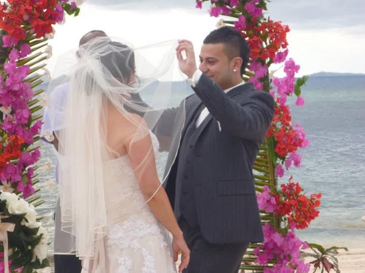 Lifting the veil under the flower arch